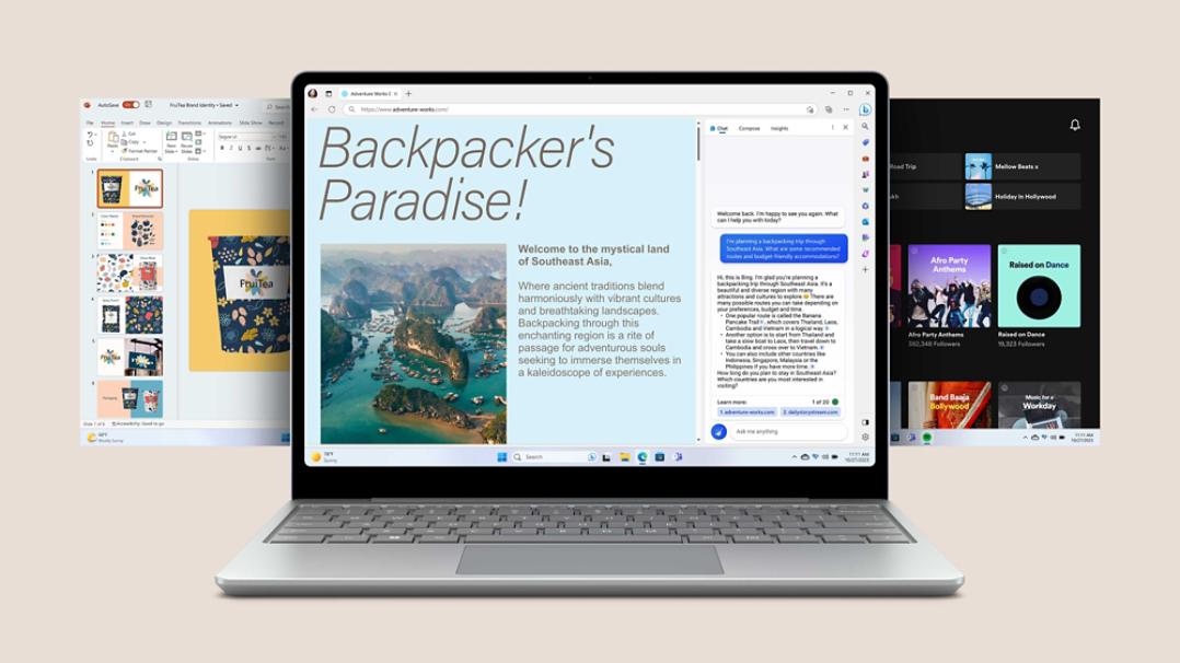 Surface Laptop Go 3 en platino que muestra Bing Edge en la pantalla con dos otras apps que aparecen desde atrás del dispositivo.