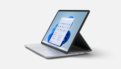 Surface Laptop Studio 置於企架上，並連接鍵盤。