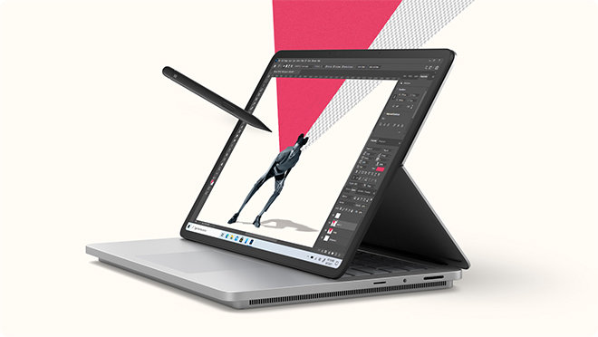 Surface Laptop Studio 2 displaying an Adobe Photoshop screen with Surface Slim Pen 2 floating above the display.