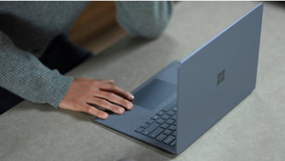 Overhead view of Surface Laptop 4 for Business on a desktop.