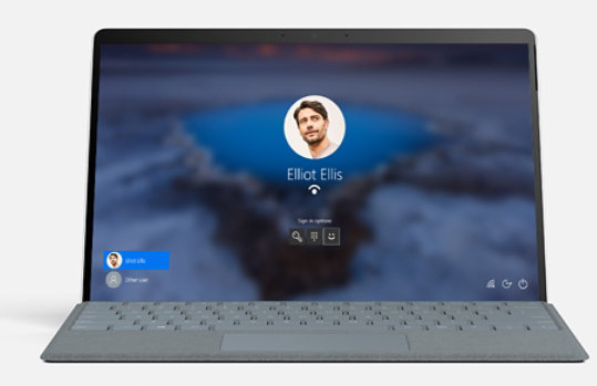 Surface Pro X with a face on screen.