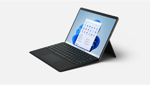 Left facing view of Surface Pro 8 in black, showing the kickstand and with a black type cover attached
