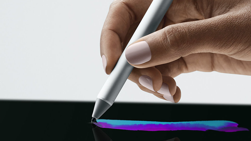 Surface Pen interacting with the screen of Surface Studio 2