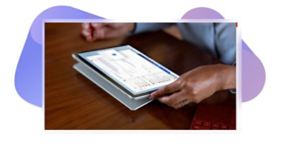 A tablet displaying conversations in Teams.