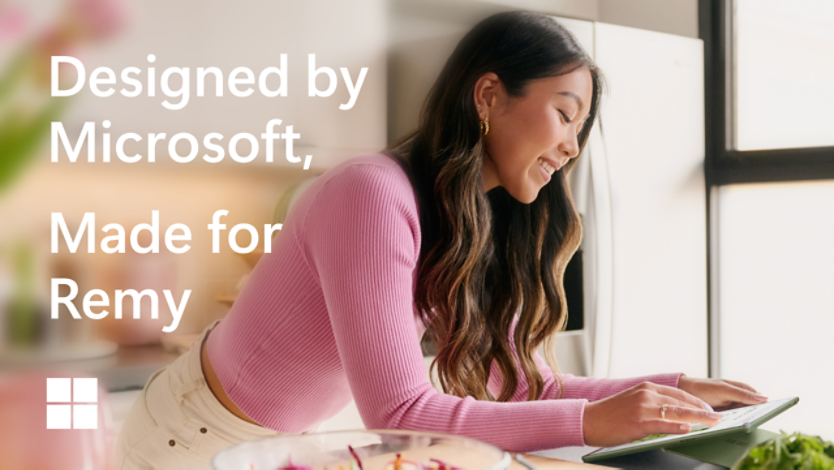 Someone using a Surface Laptop while cooking