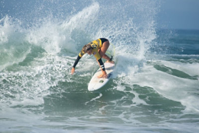 A surfer riding a wave
