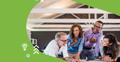 Four people laughing and having a conversation