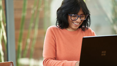 A person using a laptop.