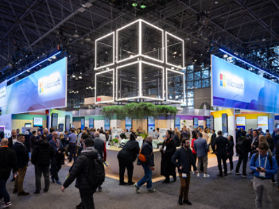 A group of people standing in a room.