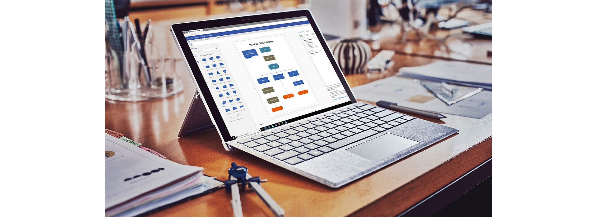 Process map displayed in Visio on a Surface laptop