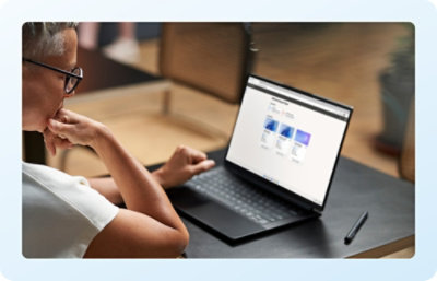 A person working on a laptop.