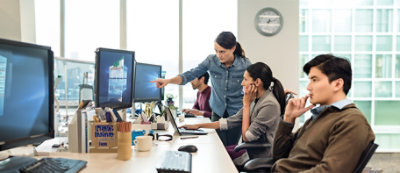 A group of people working on computers