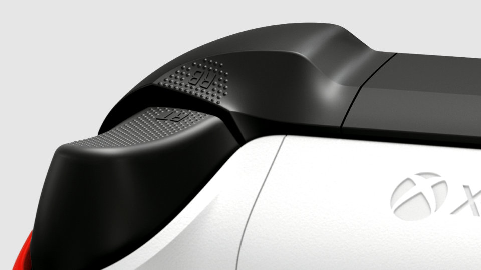 Close-up van de met rubber beklede grepen van de Xbox draadloze controller.