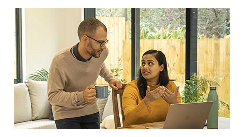 two microsoft employees smiling in the NZ office