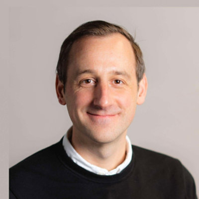 Circular headshot portrait of David Cadywould.