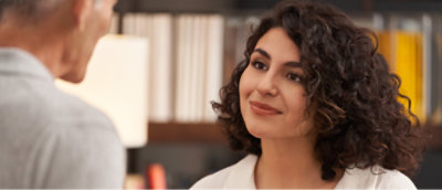 A circular flow diagram with five steps labeled "Assess," "Integrate," "Triage," "Implement," and "Monitor," connected by arrows indicating a cyclical process.