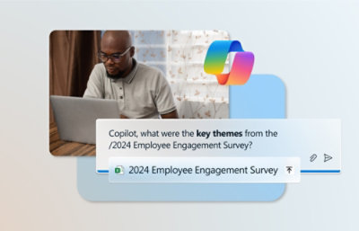 A close-up of a laptop screen displaying text related to a 2024 employee engagement survey.