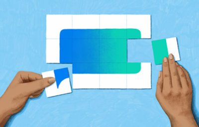 A person using both hands to complete the puzzle