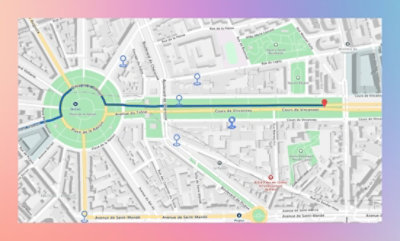 Colorful map showing a circular area with radiating streets, marked locations, and a highlighted route.