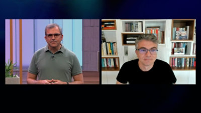 A screenshot from the video of two people having a conversation