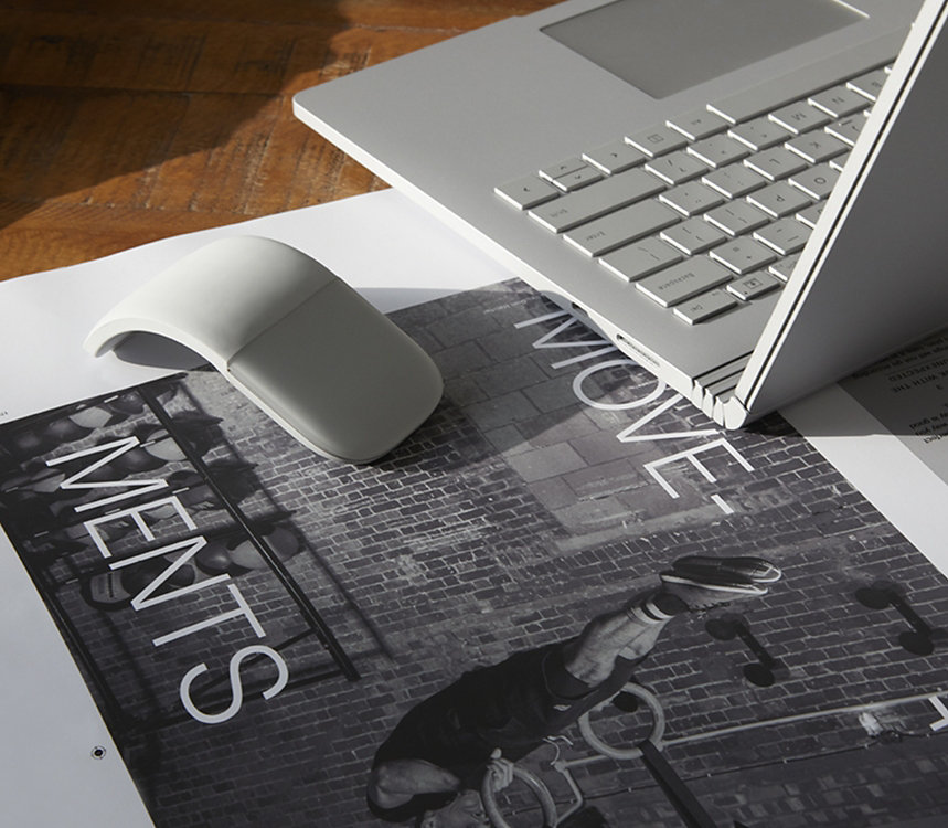 An Arc mouse and a Surface device.