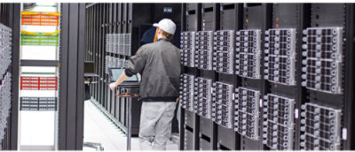 A worker in a server room