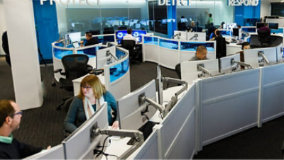 People working in an open-concept office