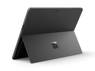 A rear angled view of a Surface Pro in the color Black with the kickstand engaged.