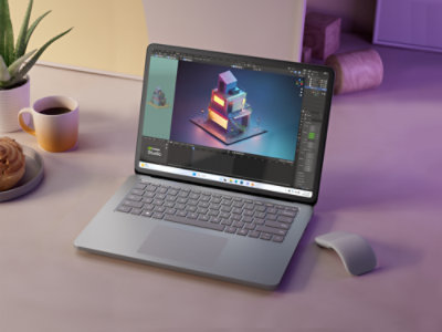 A Surface Laptop Studio 2 in Laptop mode on desk with Blender open.