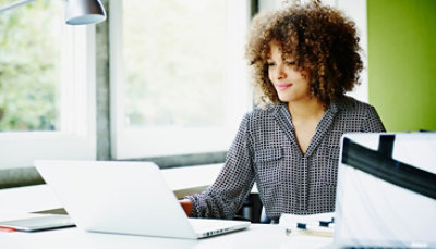 A person using a laptop computer