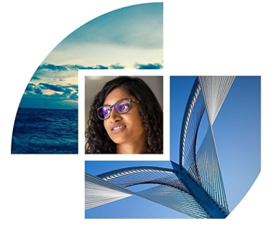 A photo of a woman with sunglasses and a blue sky.