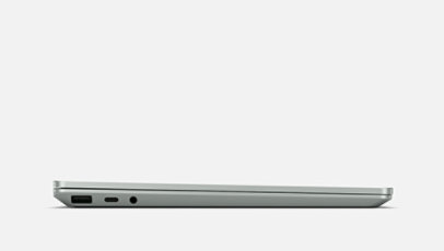 Vista de Surface Laptop Go 2 desde los laterales que muestra las opciones de puertos.