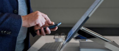 A person holding a cell phone.