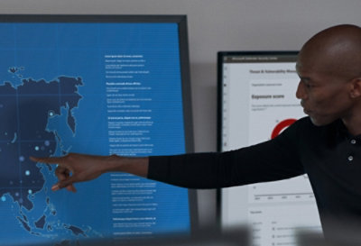 A man pointing at a map.