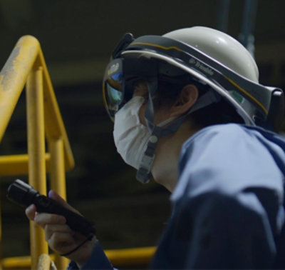 A person wearing a helmet and goggles