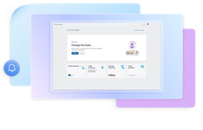 Person working on a laptop with a photo gallery on the screen, a notebook and a cup of coffee on a marble table.