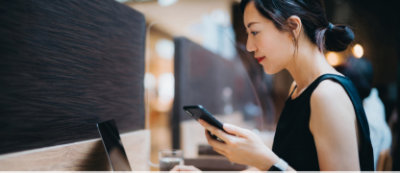 A girl looking at a phone