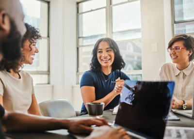 A group of people talking with each other