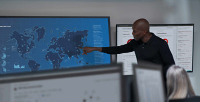 A man pointing at a map.