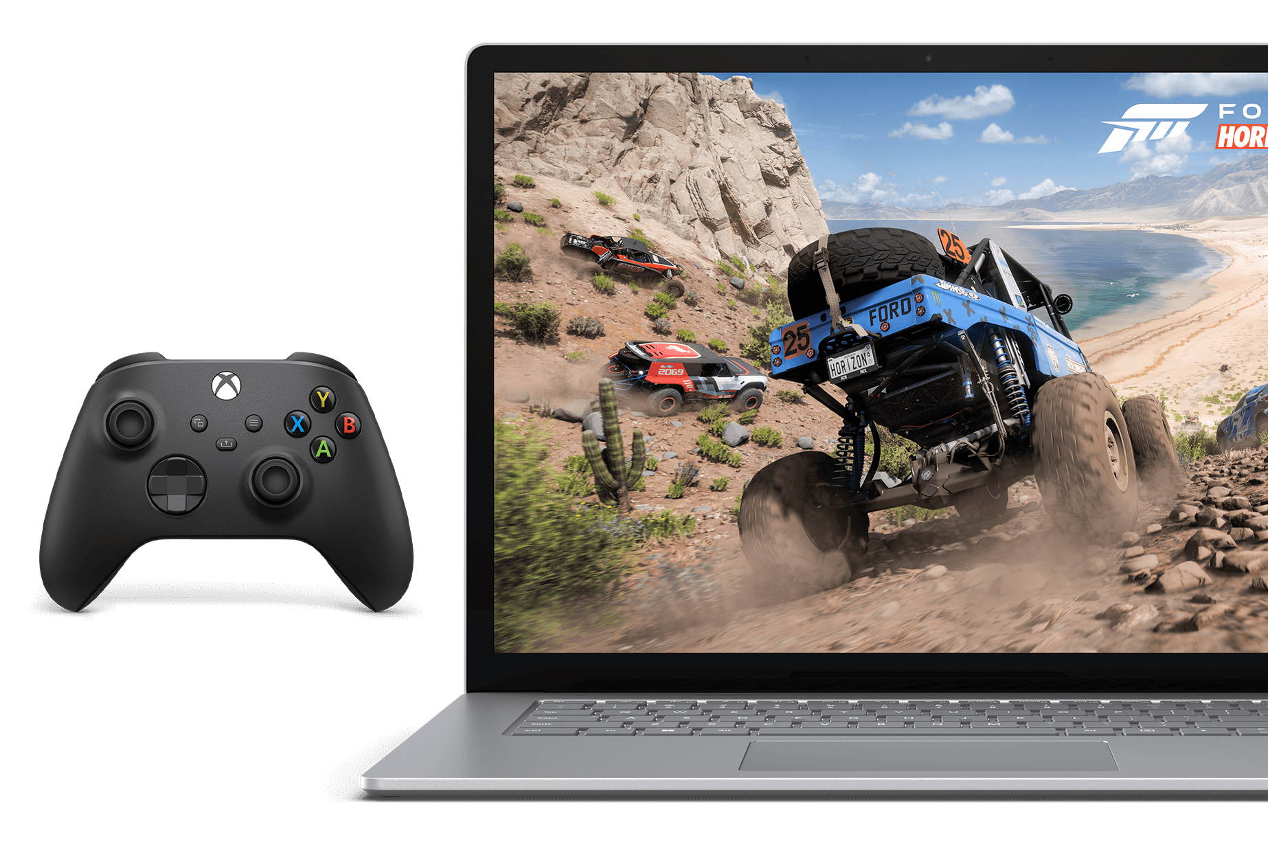Widok z przodu na Surface Laptop 5 z wyświetlonym ekranem gry wideo z monster truckiem i znajdujący się obok kontroler Xbox.