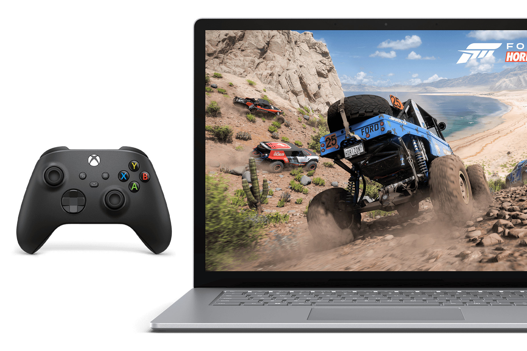 Front view of Surface Laptop 5 shows a video game of a monster truck, an Xbox controller is nearby.