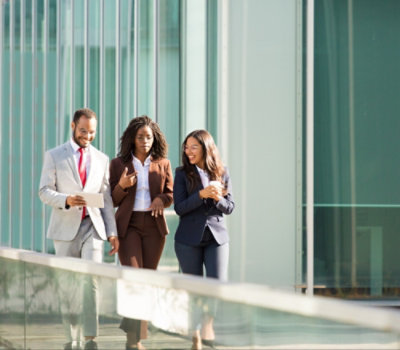A group of people walking outside