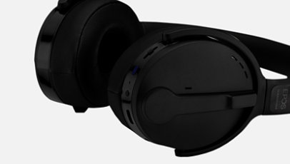 Sennheiser Adapt 560 headset in black laying down on side.