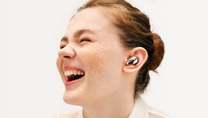 A person wearing the Samsung Galaxy Buds.