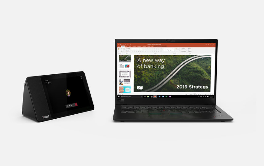 Lenovo ThinkSmart View operating Microsoft Teams alongside a laptop running Powerpoint.