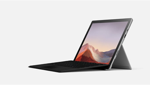 A platinum Surface Pro 7 Plus with black keyboard