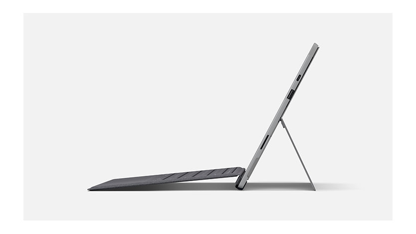 Surface Pro 7 in laptop mode with Type Cover attached and an open kickstand.