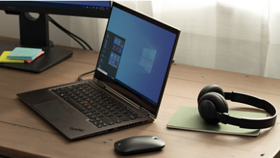 Laptop with Windows screen sitting on desk.