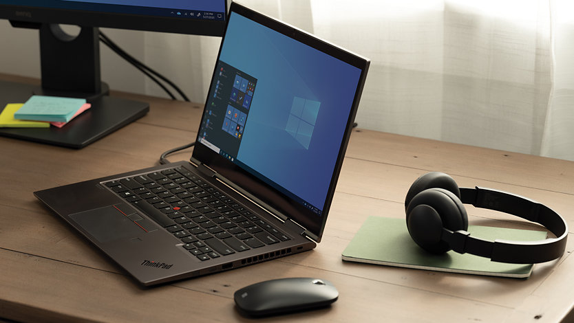 Laptop with Windows screen sitting on desk