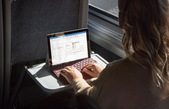 A person using their Surface Go